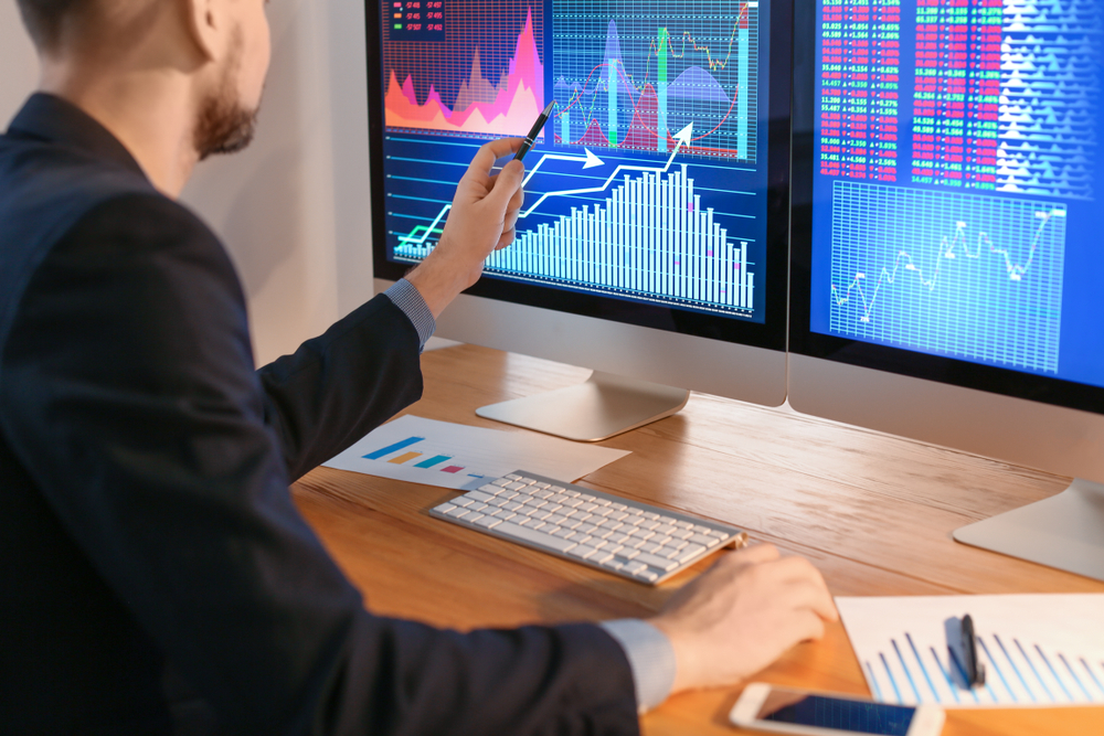 MaleBrokerWorkingInOfficeFinanceTradingConcept | Best Forex Tips IGW Management Review – Top Reasons To Choose Igwm.info (IGWManagement Scam Check)
